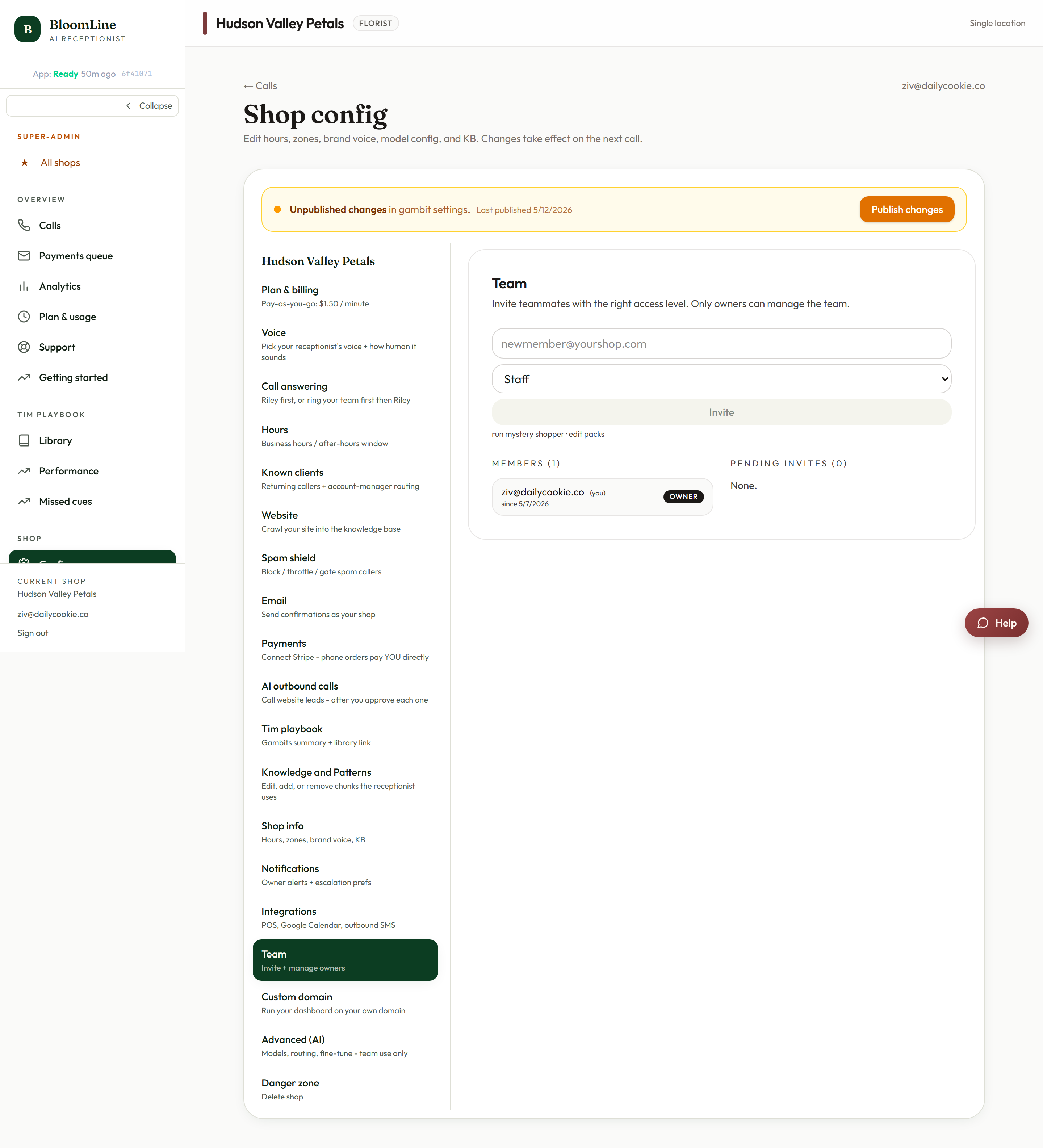 The Team tab in Shop config, with the invite email field, the role selector, and the list of current members